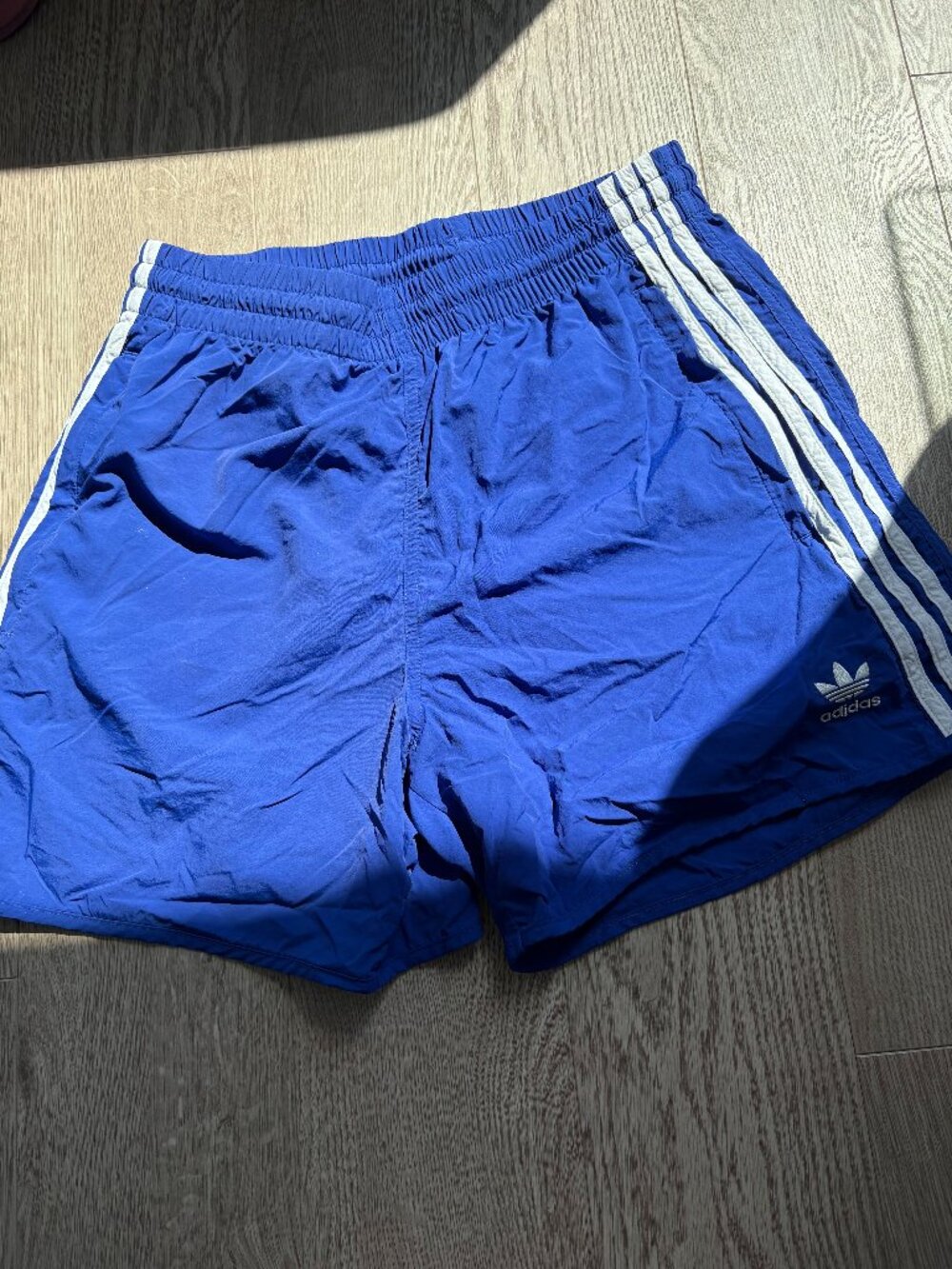 Adidas Blue athletic shorts